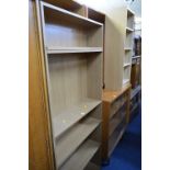 THREE VARIOUS OPEN BOOKCASES