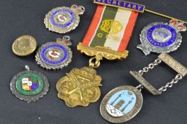 SIX VARIOUS SILVER AND ENAMEL MEDALS, c1920