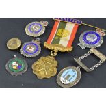 SIX VARIOUS SILVER AND ENAMEL MEDALS, c1920