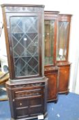 AN OAK GLAZED CORNER CUPBOARD and two modern mahogany glazed corner cupboards (two keys) (3)