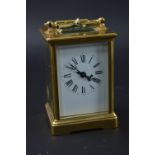 AN ENGLISH BRASS CARRIAGE CLOCK, approximate height 13.5cm (small chip to glass)