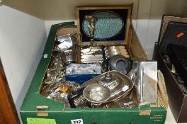 A BOX OF MIXED PLATED WARE, to include teapot, cream jug, jug and bowl, cigarette case, clock, etc