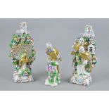 A PAIR OF CONTINENTAL PORCELAIN CANDLESTICKS, depicting a pair of birds perched on a branch and a