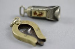 AN ENAMEL CIGAR CUTTER, and another (2)