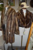 A LONG BROWN FUR COAT, with 'Victor Sequall Limited' label (quite stiff), two fur stoles (one is