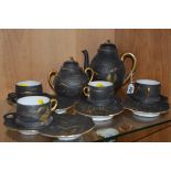 ORIENTAL EGGSHELL PART TEASET, gilt scenes on black ground, to include teapot, covered sugar and