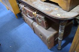 A TRAVELLING TRUNK, smaller travelling suitcase and three various reeded boxes (5)