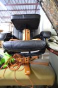 A BLACK LEATHER STYLE SWIVEL CHAIR, and a footstool (23)