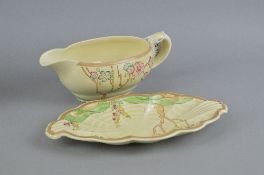 CLARICE CLIFF FOR NEWPORT POTTERY GRAVY BOAT, together with Clarice Cliff for Wilkinson Pottery