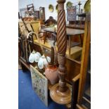 A MODERN MAHOGANY STANDARD LAMP, ten various table lamps, needlework picture and a terracotta jug