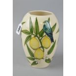 A MOORCROFT POTTERY VASE, 'Finches & Lemons' decorated on a cream ground, impressed marks to base