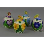 REGINALD HAGGAR, FOUR MINTONS 1930'S PRESERVE POTS, relief moulded pansies, with knob in the shape