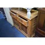 A HARDWOOD TWO DOOR CABINET, with two single drawers