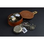 A SILVER HUNTER POCKET WATCH, marked .800, two fobs, chains and two napkin rings