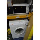 A HOOVER SIX 1100 WASHING MACHINE, and a microwave (2)