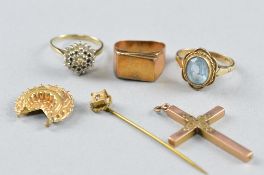 A MIXED LOT OF 9CT GOLD YELLOW METAL, including three rings, cross, tie pin etc