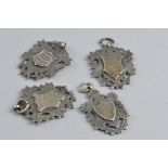 FOUR MIXED SILVER FOBS, c.1912, approximate weight 48.6 grams