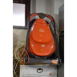 A FLYMO EASI GLIDE 330 ELECTRIC LAWNMOWER, and two electric hedge trimmers (3)