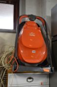 A FLYMO EASI GLIDE 330 ELECTRIC LAWNMOWER, and two electric hedge trimmers (3)