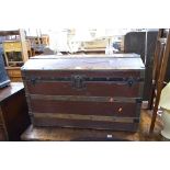 A VINTAGE DOMED TOPPED TRUNK, with metal and wooden banding, J. Ingram refs, Trunk & Bag Depot, 54