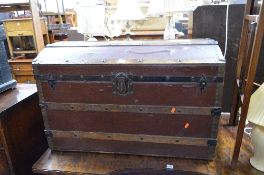A VINTAGE DOMED TOPPED TRUNK, with metal and wooden banding, J. Ingram refs, Trunk & Bag Depot, 54