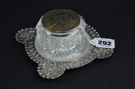 A SILVER AND TORTOISESHELL TOPPED JAR, on a silver butter dish