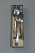 A SET OF SIX GEORGE III OLD ENGLISH PATTERN TEA SPOONS, bright cut decoration and engraved initials,