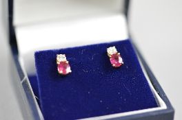 A PAIR OF 18CT RUBY AND DIAMOND EARRINGS