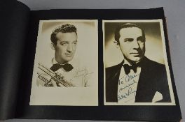 ONE ALBUM OF PHOTOGRAPHS OF 1940'S-1950'S FILM STARS, many with signatures but mostly Film Studio
