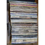 A BOX OF OVER 100 P.L'S, 12'' AND 7'' SINGLES, by artists including David Bowie, U2, Genesis, The