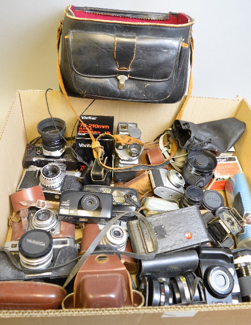 A TRAY OF CAMERAS AND EQUIPMENT, including an Olympus OM1, a Yashica Electro 35, a Praktica Nova