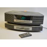 A BOSE WAVE MUSIC SYSTEM, with multi CD changer in slate grey, model No.WWRCC5, Serial No.