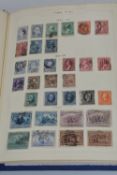 A COLLECTION OF USA STAMPS, in an album with early issues, 1898 Omaha to 50c USA