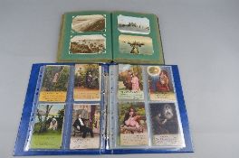 TWO ALBUMS OF POSTCARDS, one album contains coastal resort scenes from the Edwardian era to the
