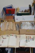 AN ACCUMULATION OF STAMPS, in albums, stockbooks and loose (four boxes)