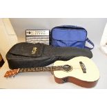 A MARTIN LXME LITTLE MARTIN ACOUSTIC GUITAR, in its original case, made in Mexico and fitted with