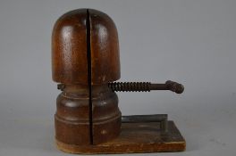 AN EARLY 20TH CENTURY WOODEN HAT STRETCHER, length approximately 31cm, height approximately 34cm,