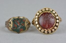 AN INTAGLIO RING, domed plaque with inset cornelian cabochon, intaglio measuring approximately 14.