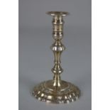 A GEORGE II SILVER TAPER STICK, by William Gould, London 1732, knopped baluster stem, fluted