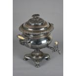 A VICTORIAN SILVER PLATED SAMOVAR, with two scrolling cast side handles and centrally fitted with