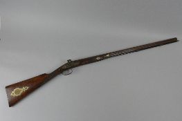 AN ANTIQUE 33 BORE 31 3/4'' DAMASCUS SINGLE BARREL PERCUSSION SMOOTH BORE GUN, bearing the name