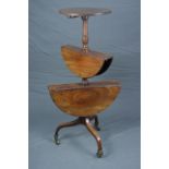 AN EARLY 19TH CENTURY MAHOGANY THREE TIER DUMB WAITER, graduated drop leaf design, baluster turned