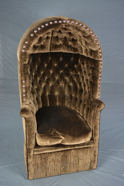 A 19TH CENTURY STYLE PORTER'S CHAIR, brown velvet upholstery, studded detail to arch, button back,