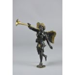 A CAST METAL FIGURE OF AN ANGEL BLOWING A HORN, bronzed finish with gilt laurel wreath, wings tips
