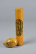 A VICTORIAN MAUCHLINE WARE CYLINDRICAL BODKIN CASE, printed with 'Rothesay from the East' and an egg