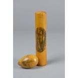 A VICTORIAN MAUCHLINE WARE CYLINDRICAL BODKIN CASE, printed with 'Rothesay from the East' and an egg