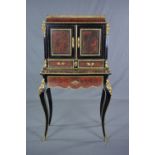 AN EARLY 20TH CENTURY LOUIS XVI REVIVAL BOULLE BONHEUR DU JOUR, the upper section enclosed by a pair