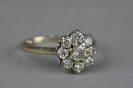 A MID 20TH CENTURY DIAMOND ROUND CLUSTER RING, estimated modern round brilliant cut weight 0.50ct,