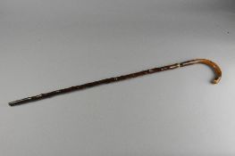 A LATE VICTORIAN/EDWARDIAN SWORD STICK, the steel blade marked F. Escoffier, 4, St. Etienne, the