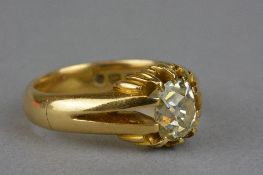 AN EARLY 20TH CENTURY GENTS SINGLE STONE DIAMOND RING, an old cushion cut diamond, estimated